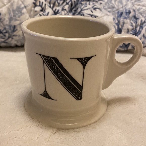 Black and white decorative mug with the capital letter N stamped on the bottom - Picture 3 of 12